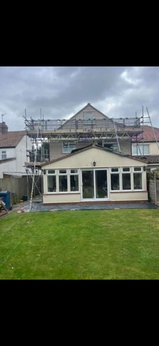 Scaffolding above a house extension