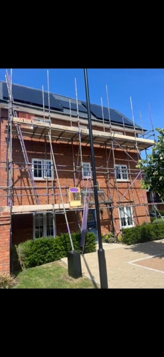 Residential scaffolding on a brick house